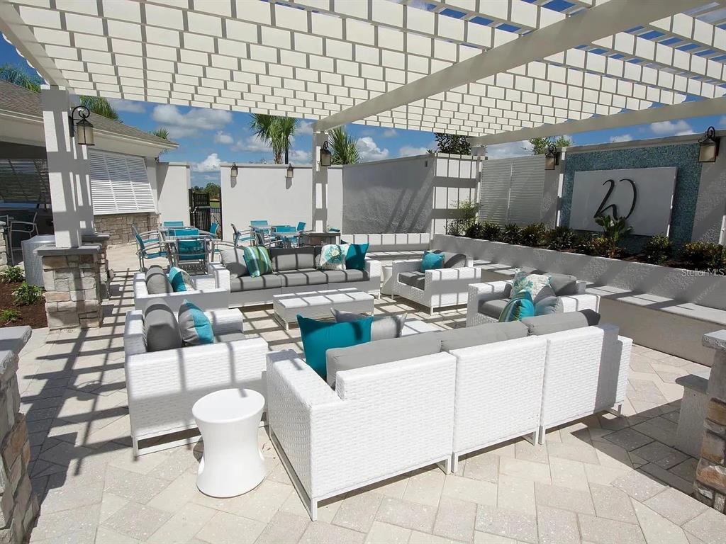13340 Pontoon Road Winter Garden, FL 34787 - Photo 12 of 15 a outdoor space with lots of white furniture