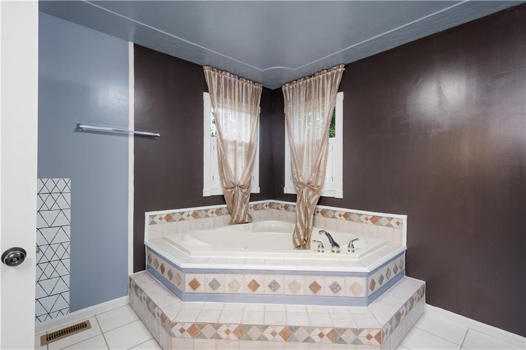 3054 Bedillion Road Washington, PA 15301 - Photo 22 of 45 End the day with a long soak in your private primary bath.