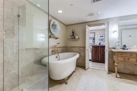 a kitchen with granite countertop a sink stainless steel appliances and cabinets