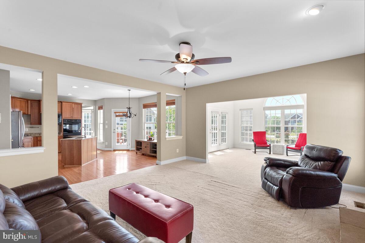 42819 Conquest Circle Ashburn, VA 20148 - Photo 22 of 55 a living room with furniture and a large window