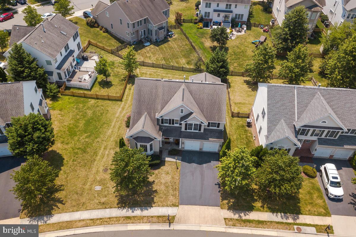 42819 Conquest Circle Ashburn, VA 20148 - Photo 4 of 55 an aerial view of a residential apartment building with a yard