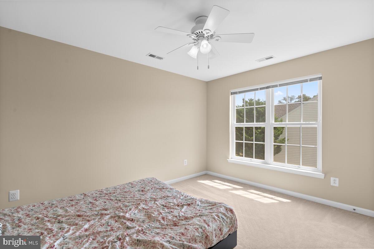 42819 Conquest Circle Ashburn, VA 20148 - Photo 36 of 55 a view of a bedroom with a large window