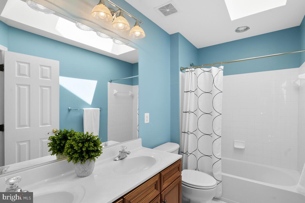 42819 Conquest Circle Ashburn, VA 20148 - Photo 37 of 55 a bathroom with a sink a toilet and shower