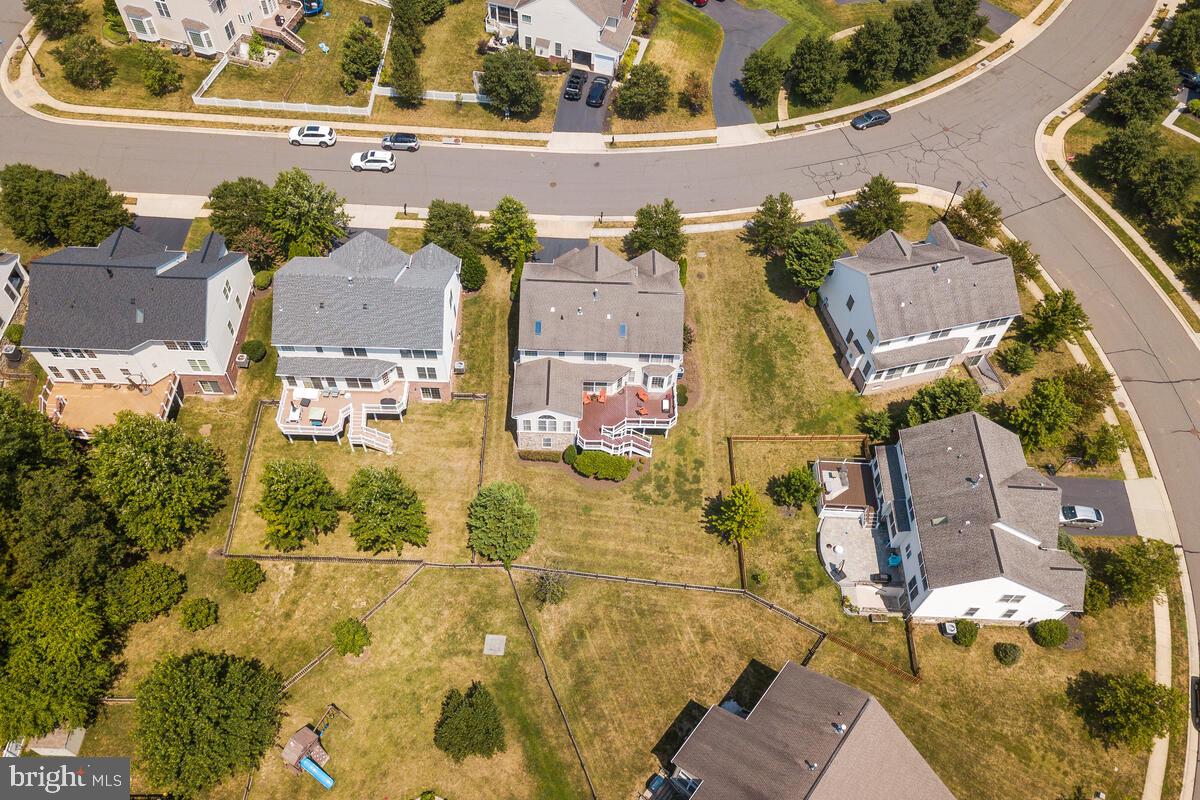 42819 Conquest Circle Ashburn, VA 20148 - Photo 50 of 55 an aerial view of residential houses with outdoor space