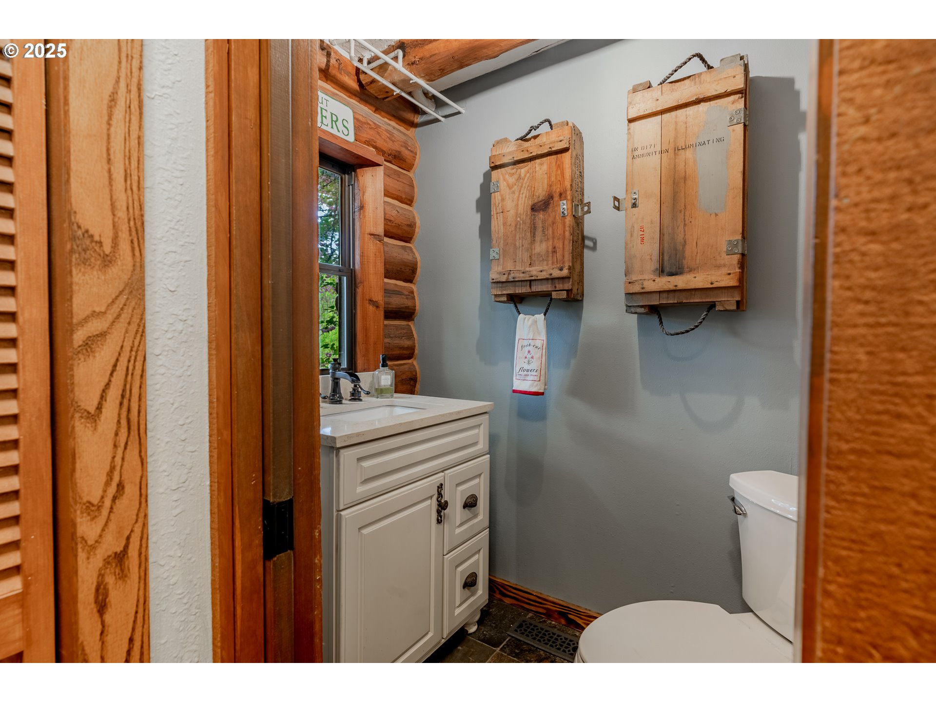16850 Southwest Pit Road Hillsboro, OR 97123 - Photo 12 of 48 a bathroom with a sink a mirror and toilet