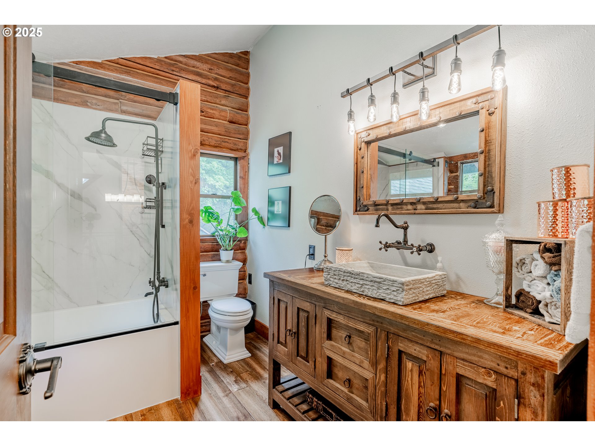 16850 Southwest Pit Road Hillsboro, OR 97123 - Photo 14 of 48 a bathroom with a granite countertop sink toilet and shower