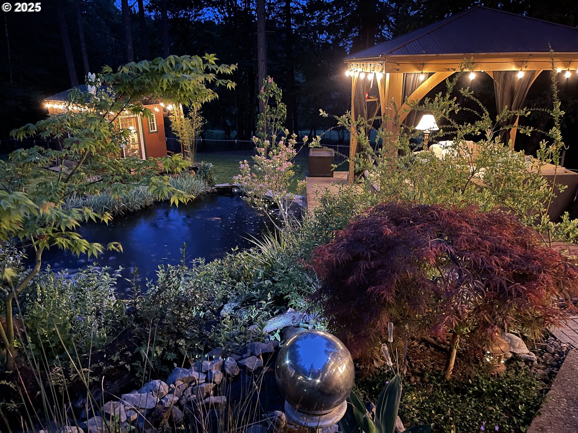 16850 Southwest Pit Road Hillsboro, OR 97123 - Photo 39 of 48 a view of a swimming pool with sitting area and garden