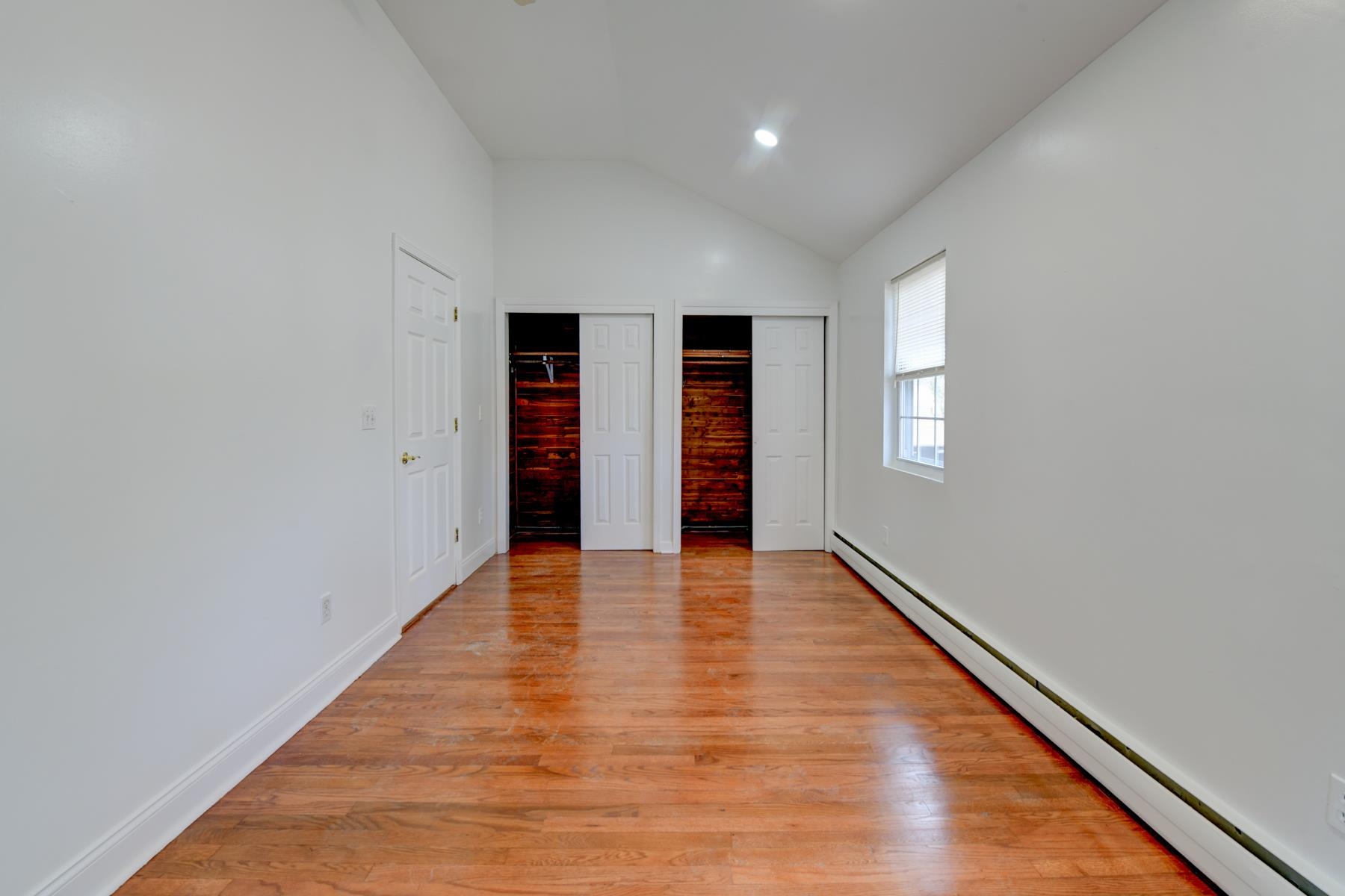 10 Toye Street Randolph, NJ 07869 - Photo 11 of 48 wooden floor in an empty room with a window