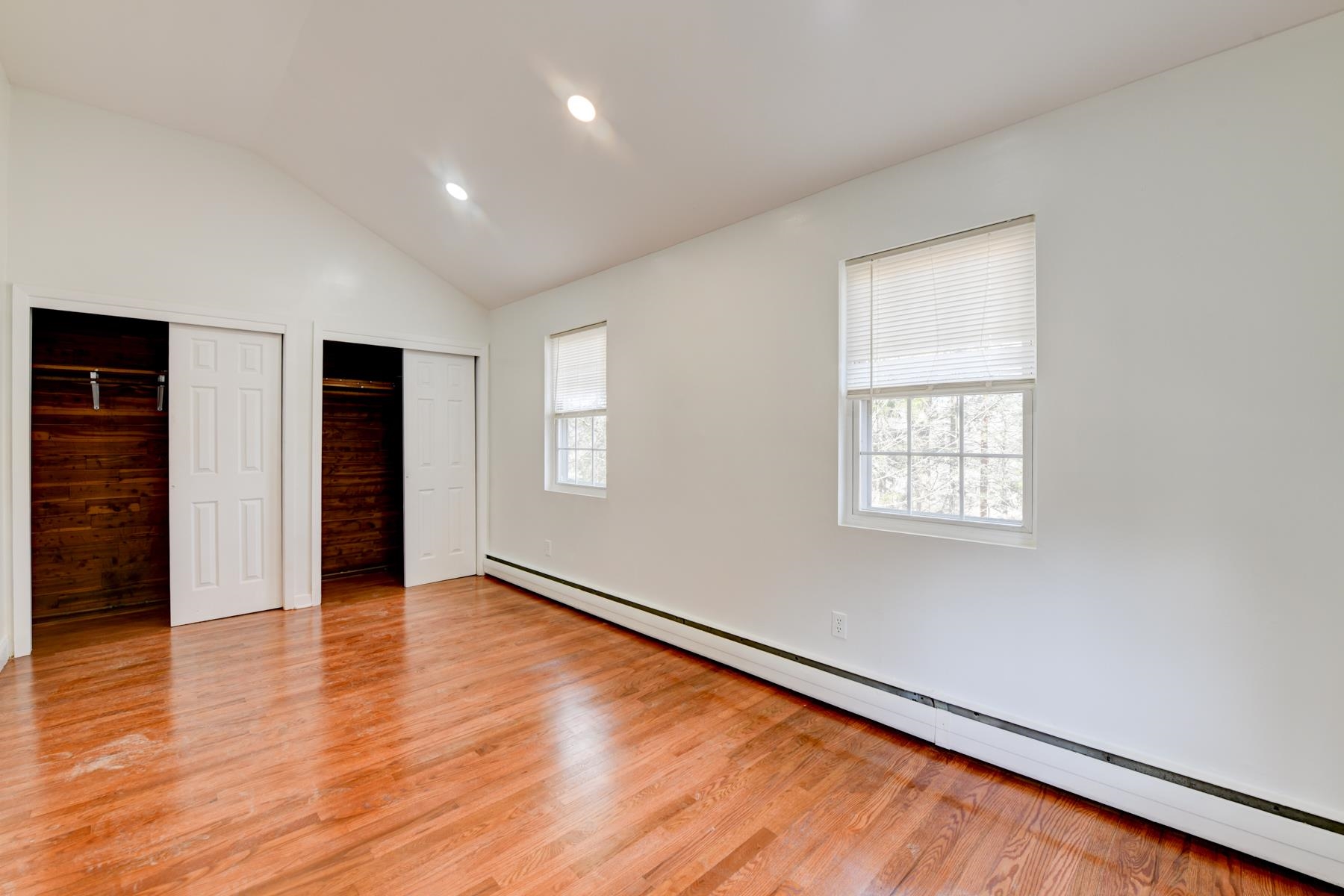 10 Toye Street Randolph, NJ 07869 - Photo 12 of 48 an empty room with wooden floor and windows