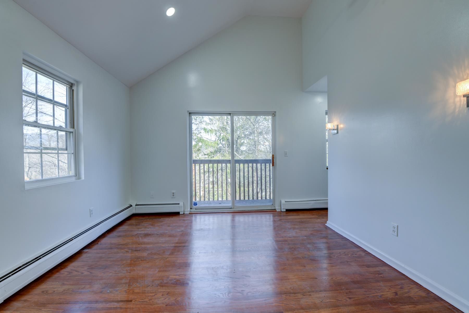 10 Toye Street Randolph, NJ 07869 - Photo 16 of 48 wooden floor in an empty room with a window
