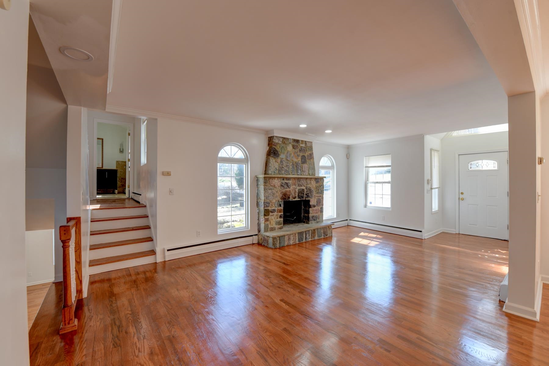 10 Toye Street Randolph, NJ 07869 - Photo 18 of 48 a view of an empty room with wooden floor and a window