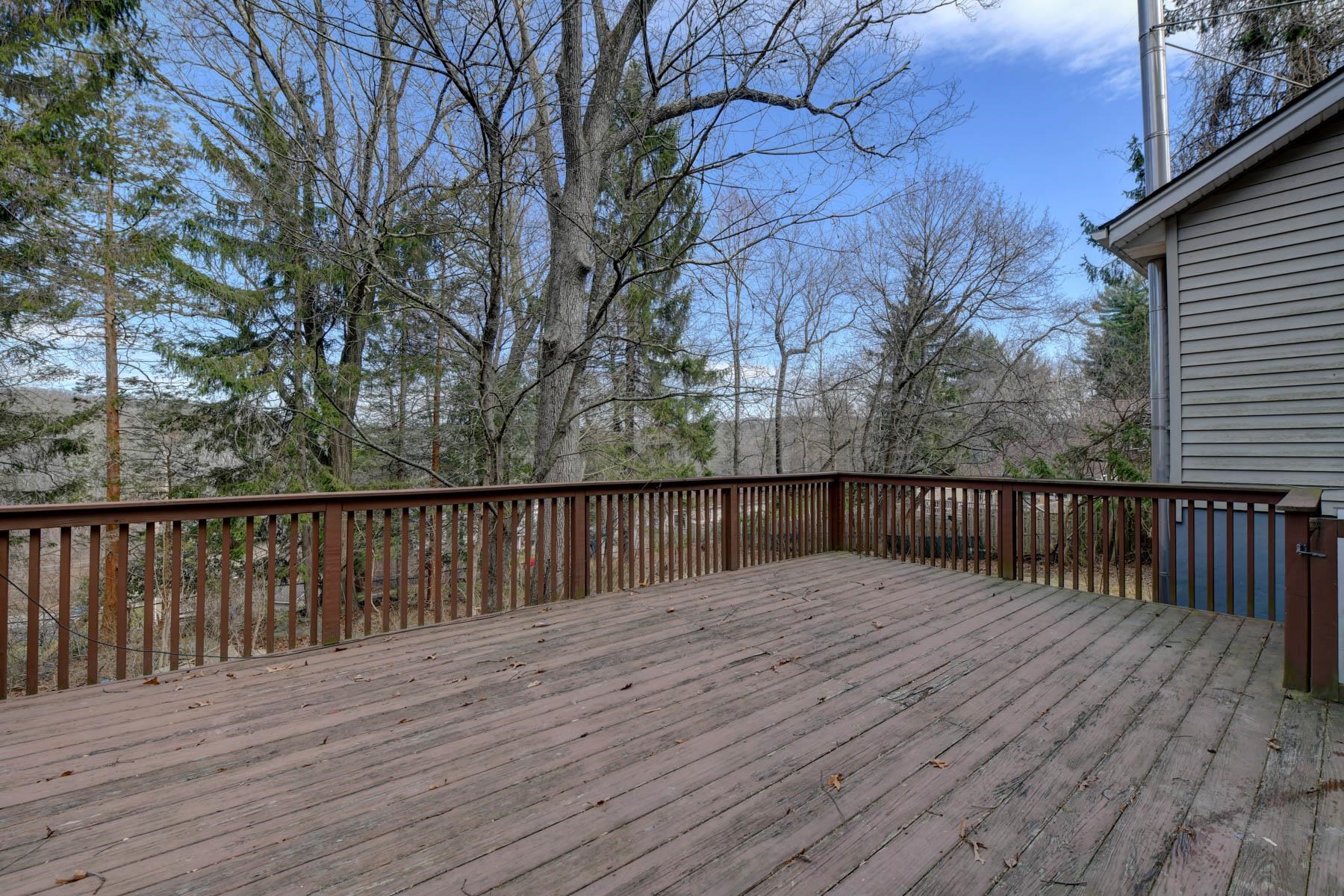 10 Toye Street Randolph, NJ 07869 - Photo 25 of 48 a balcony with wooden floor and trees