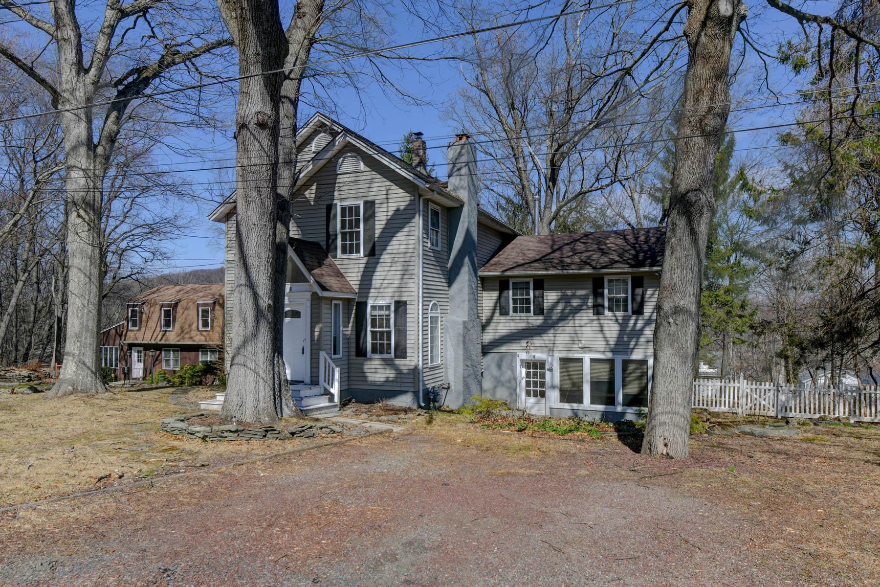 10 Toye Street Randolph, NJ 07869 - Photo 31 of 48 a front view of a house with a dirt yard