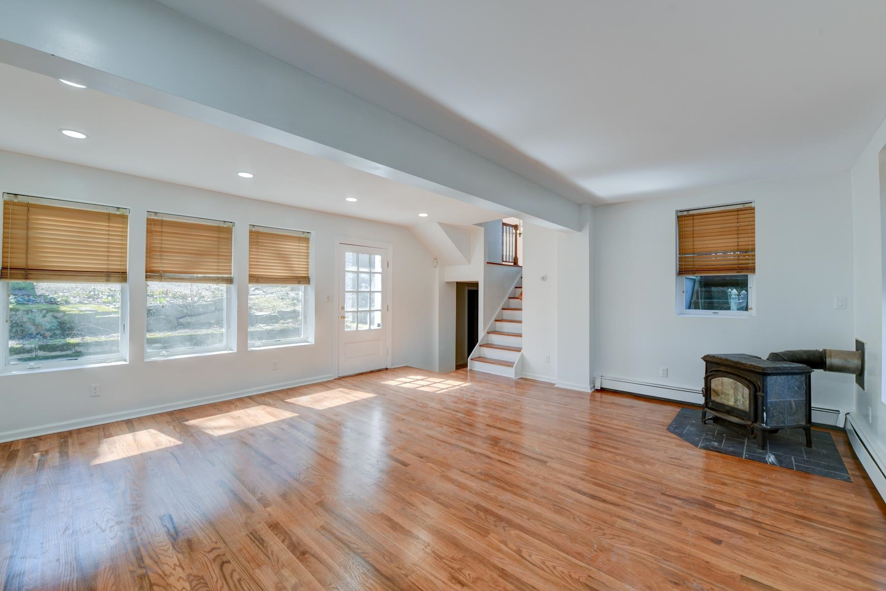 10 Toye Street Randolph, NJ 07869 - Photo 33 of 48 a view of an empty room with a window and wooden floor