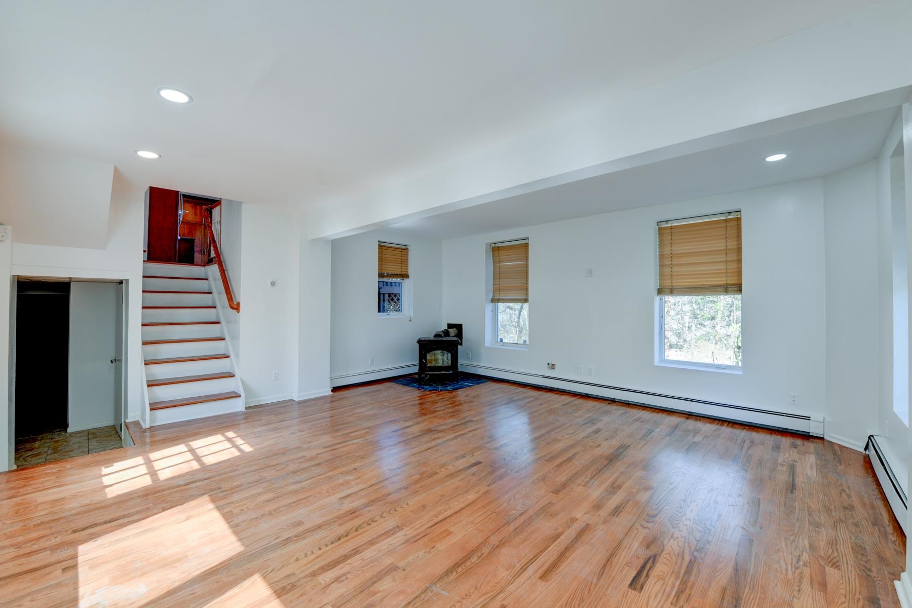 10 Toye Street Randolph, NJ 07869 - Photo 34 of 48 a view of an empty room with wooden floor and a window