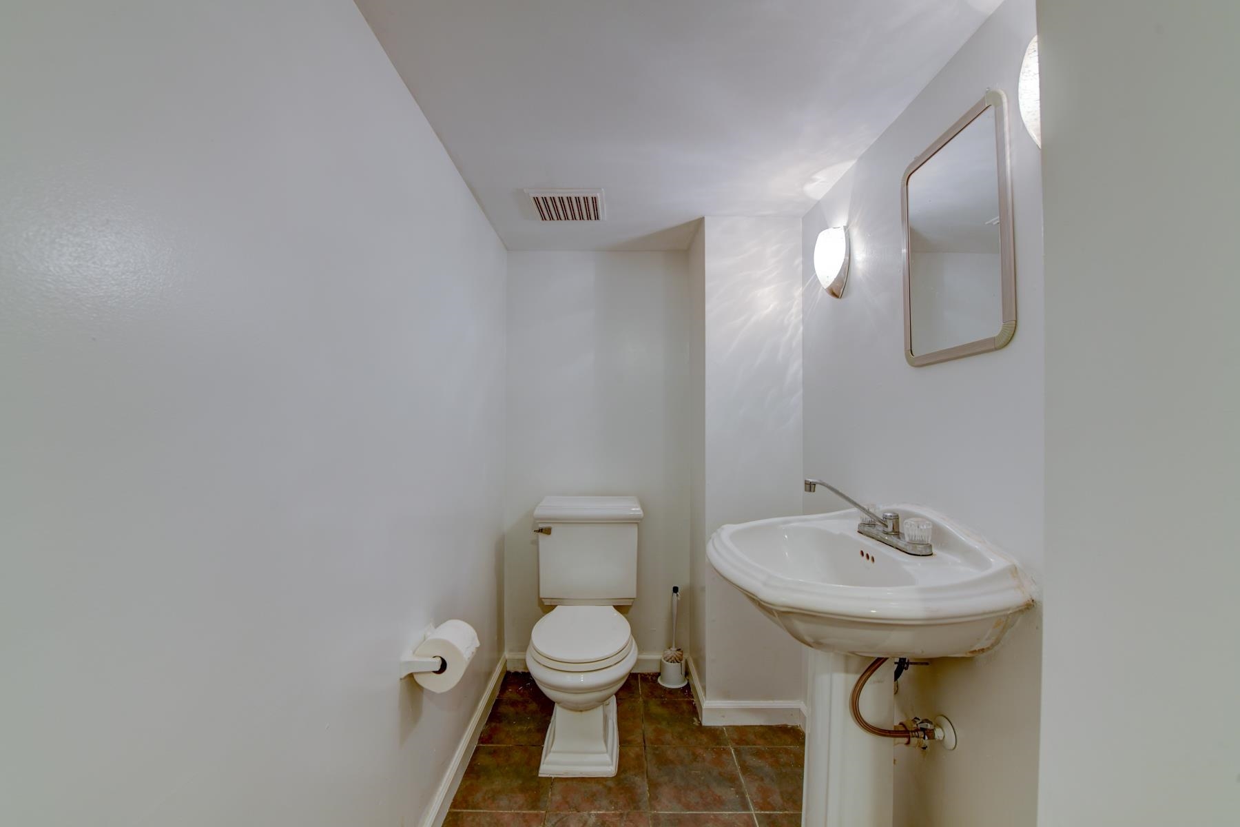 10 Toye Street Randolph, NJ 07869 - Photo 38 of 48 a bathroom with a sink and mirror