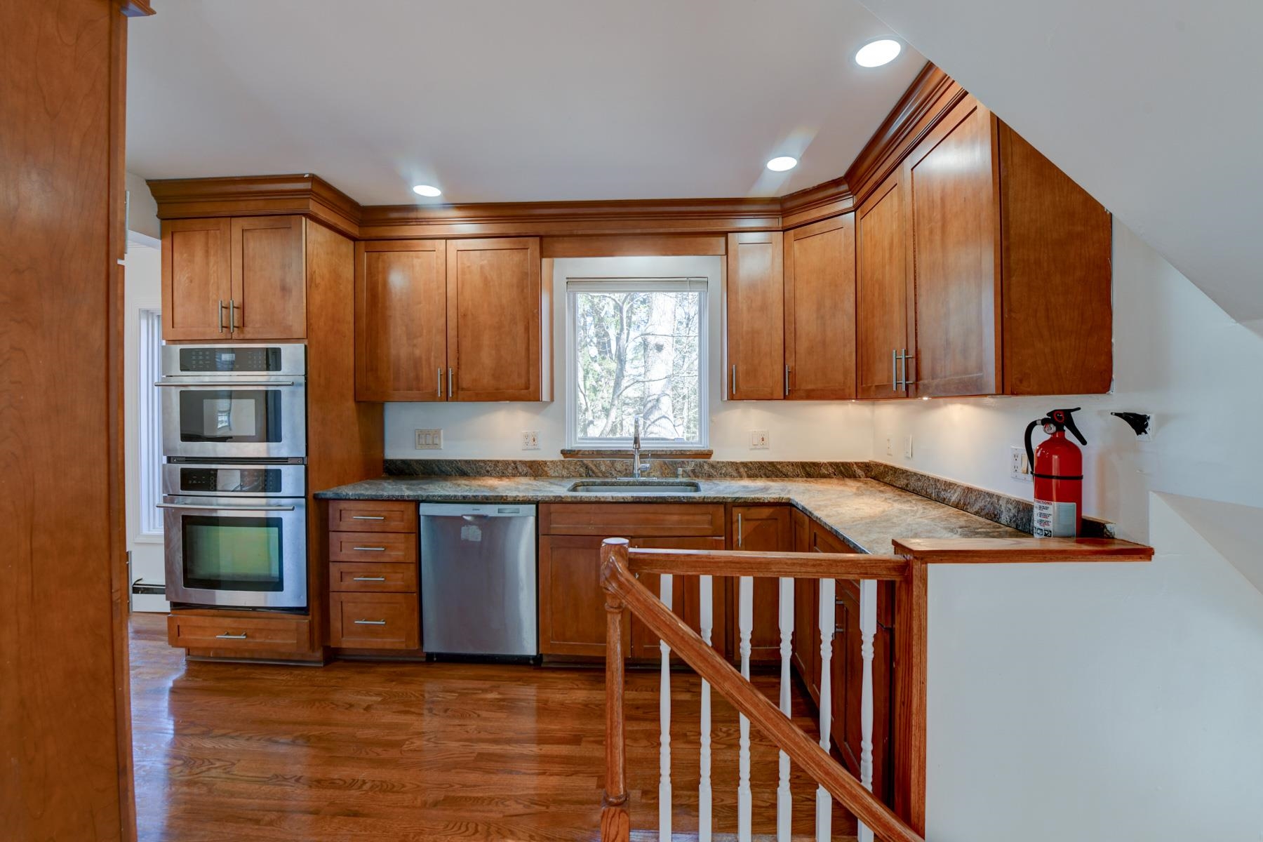 10 Toye Street Randolph, NJ 07869 - Photo 40 of 48 a kitchen with stainless steel appliances granite countertop a stove and a sink