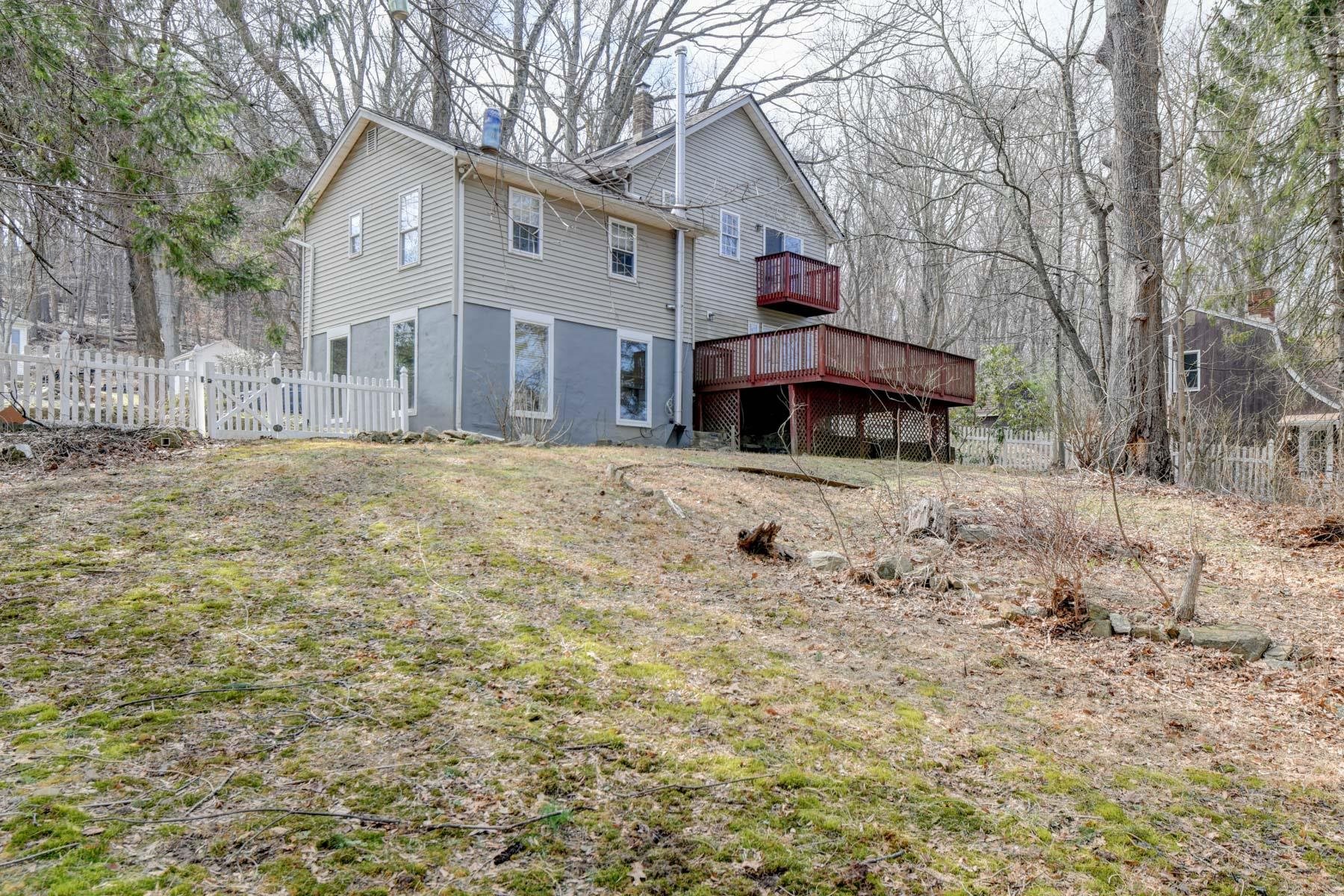 10 Toye Street Randolph, NJ 07869 - Photo 4 of 48 a front view of a house with a yard covered in snow