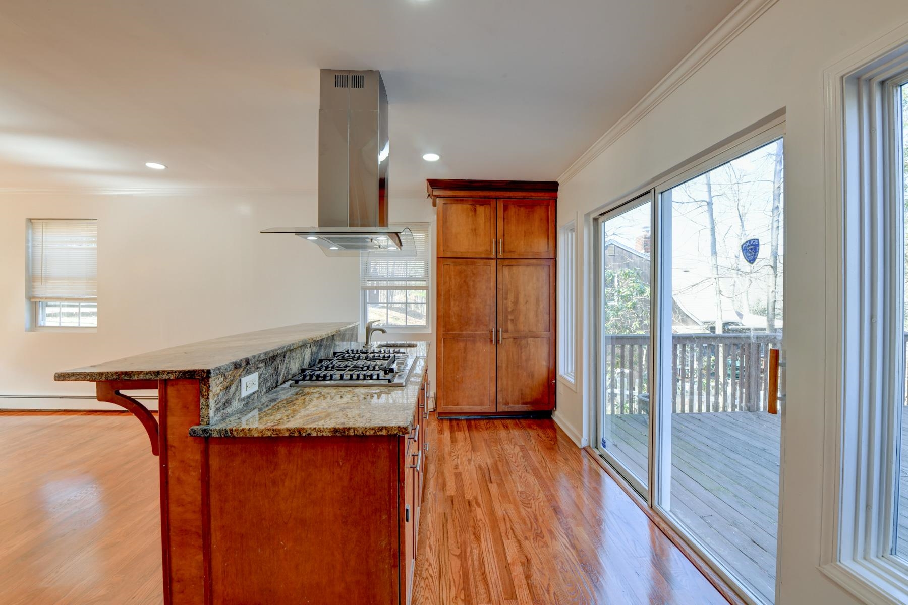 10 Toye Street Randolph, NJ 07869 - Photo 41 of 48 a hallway with a large window and wooden floor