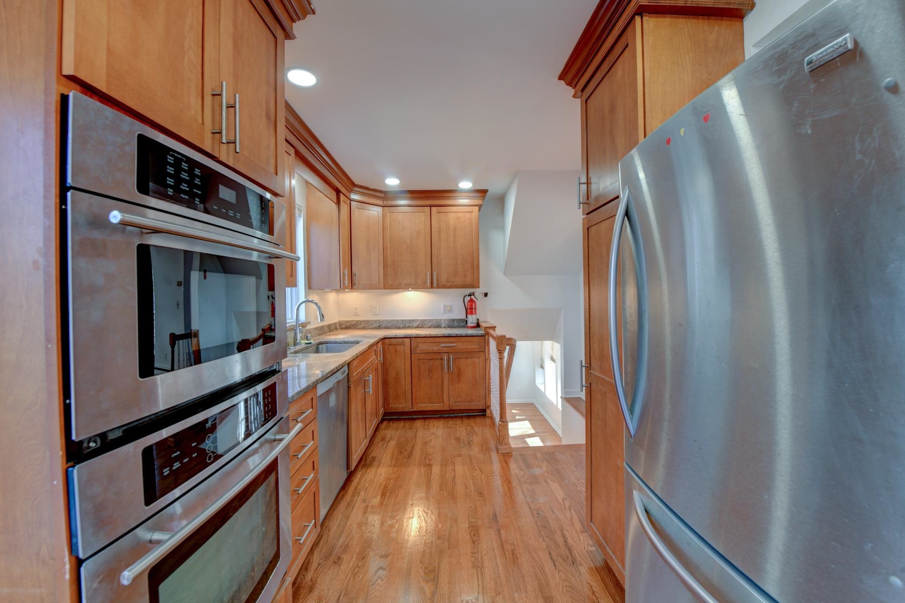 10 Toye Street Randolph, NJ 07869 - Photo 43 of 48 a kitchen with stainless steel appliances a refrigerator a stove and cabinets