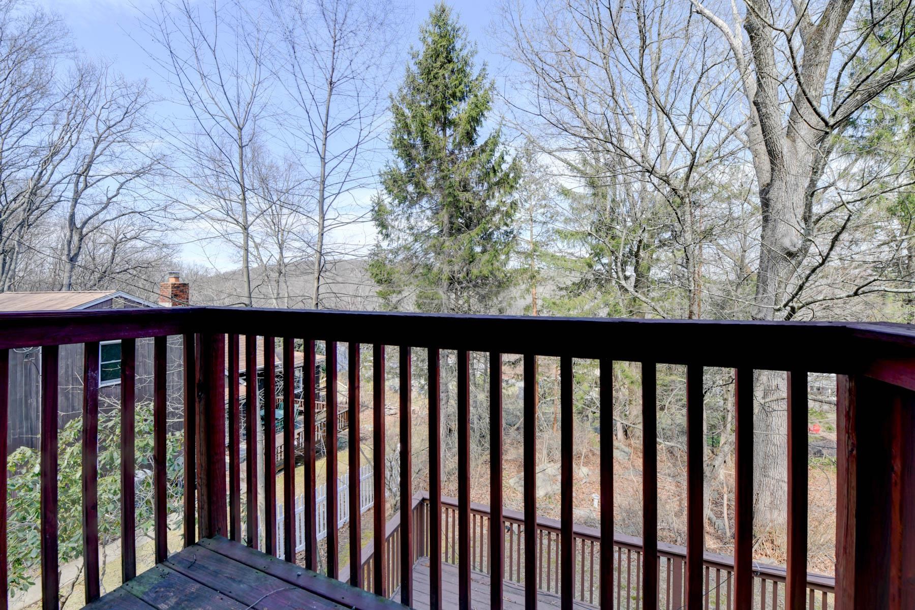 10 Toye Street Randolph, NJ 07869 - Photo 7 of 48 a balcony with wooden floor and fence