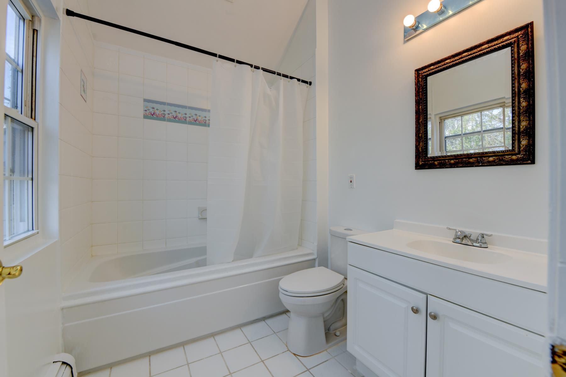10 Toye Street Randolph, NJ 07869 - Photo 10 of 48 a bathroom with a toilet a sink and bathtub
