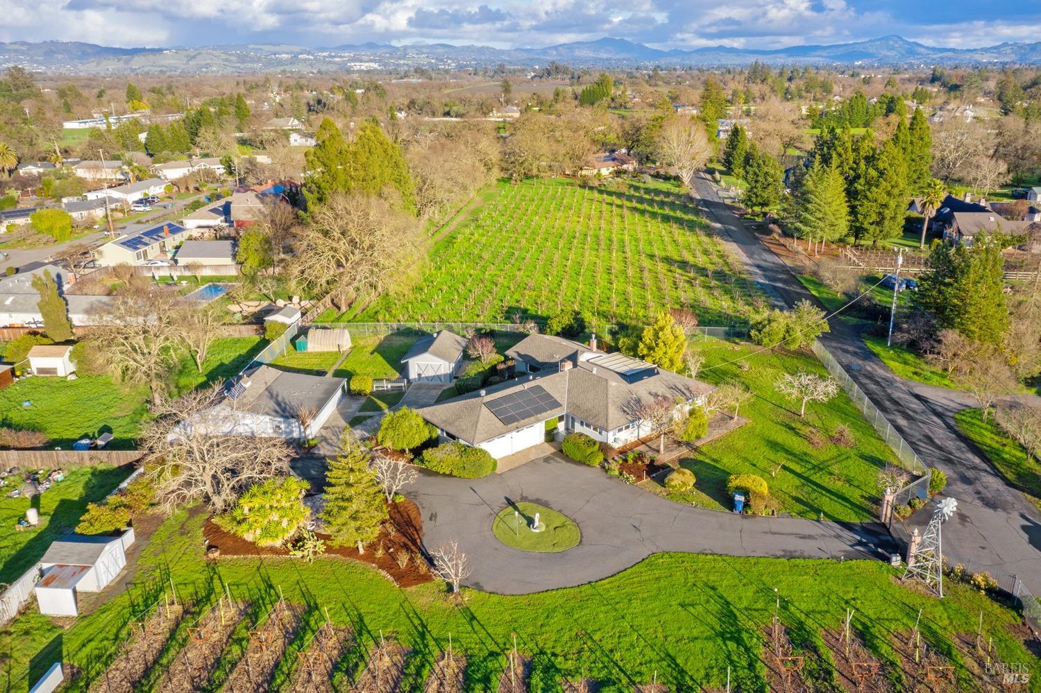 1764 Olivet Road Santa Rosa, CA 95401 - Photo 1 of 1 an aerial view of residential houses with outdoor space