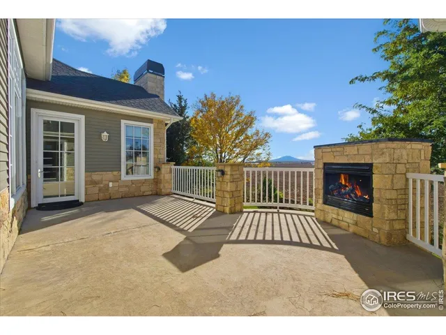 a view of a dining room with furniture wooden floor and a chandelier