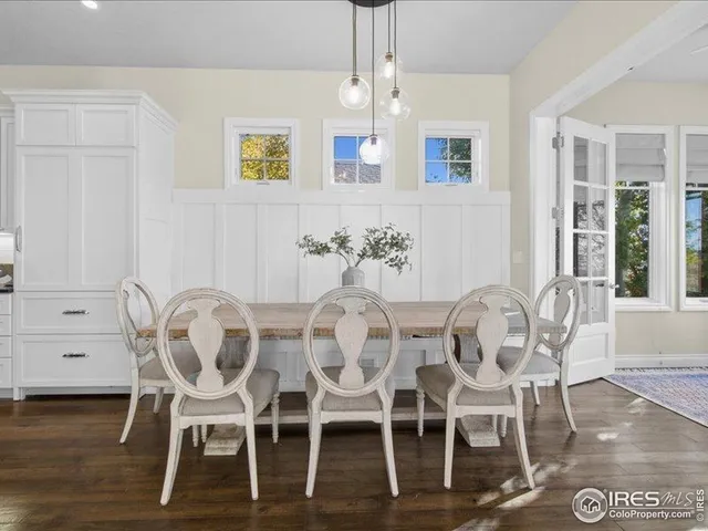 a bed sitting in a room next to a window
