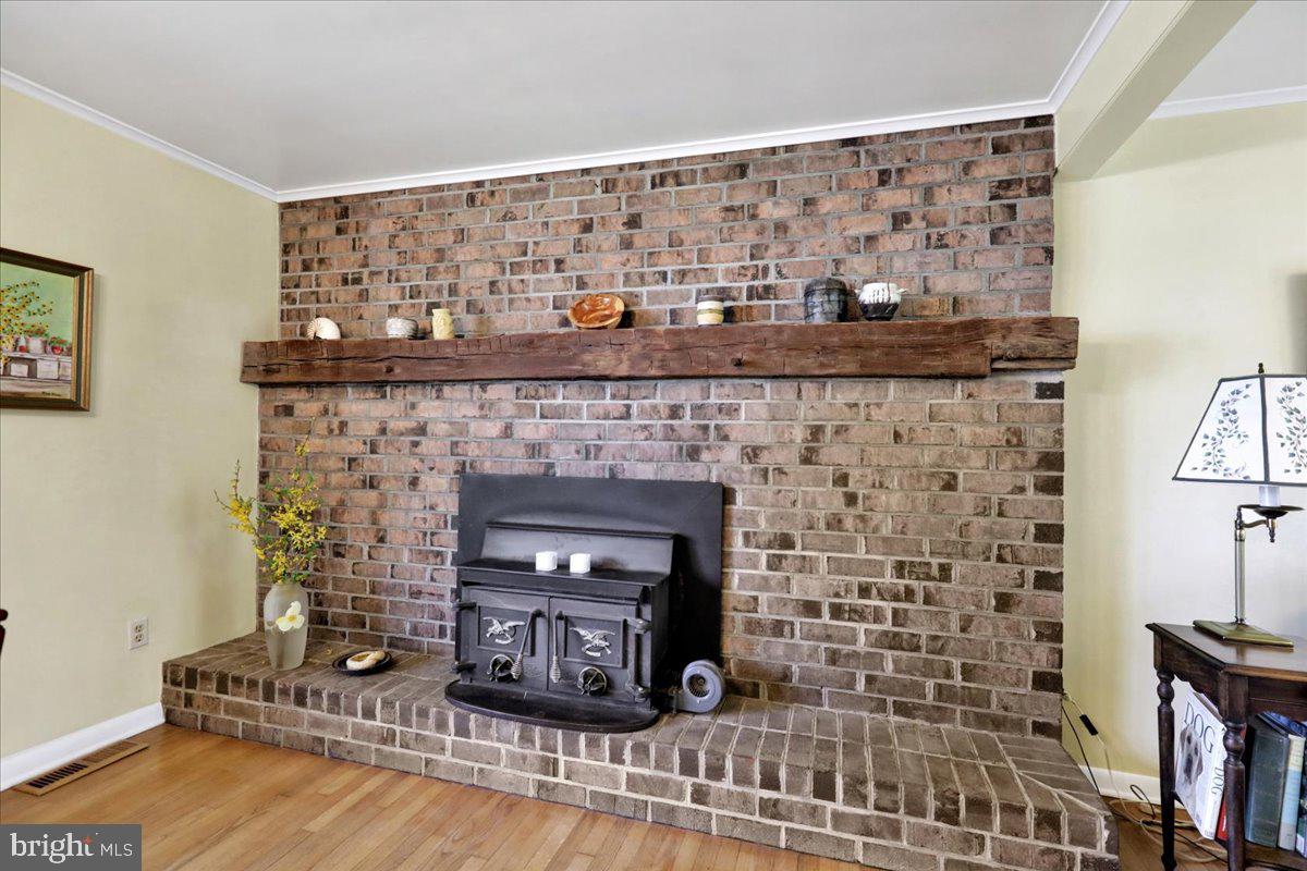 250 Clearfield Road New Providence, PA 17560 - Photo 11 of 35 a living room with a fireplace