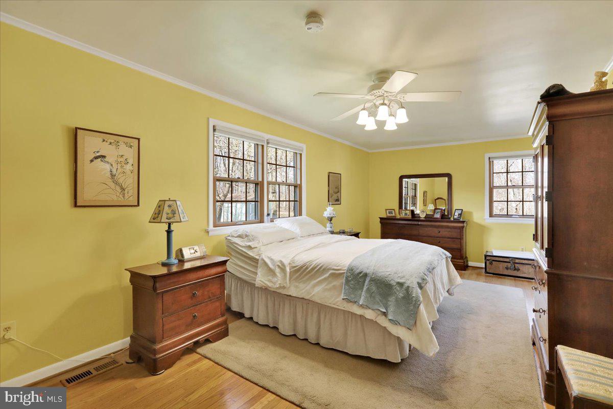 250 Clearfield Road New Providence, PA 17560 - Photo 22 of 35 a bedroom with a bed dresser and a window