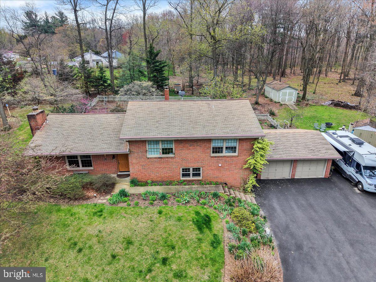 250 Clearfield Road New Providence, PA 17560 - Photo 3 of 35 an aerial view of a house with garden