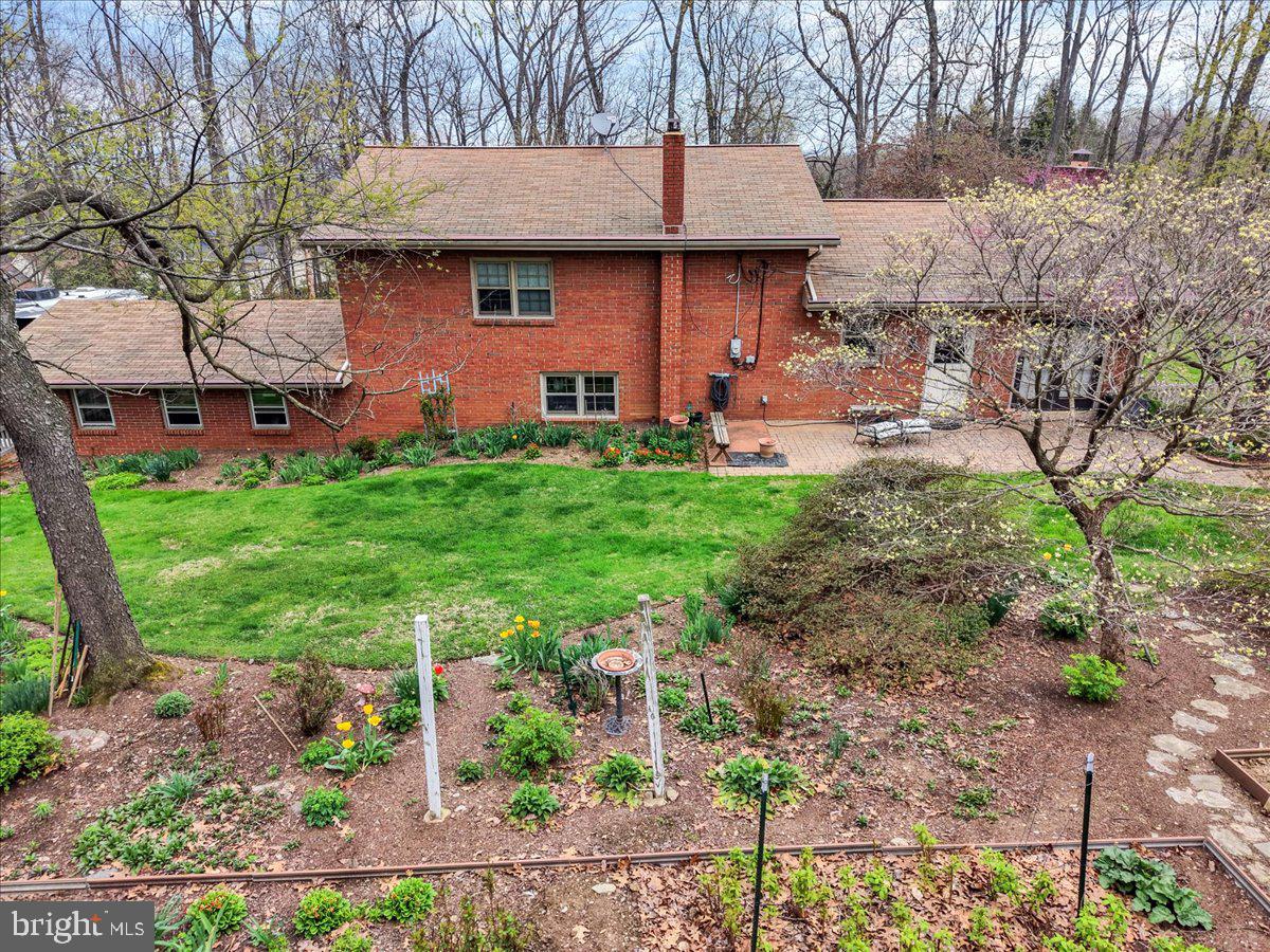 250 Clearfield Road New Providence, PA 17560 - Photo 5 of 35 a front view of a house with garden