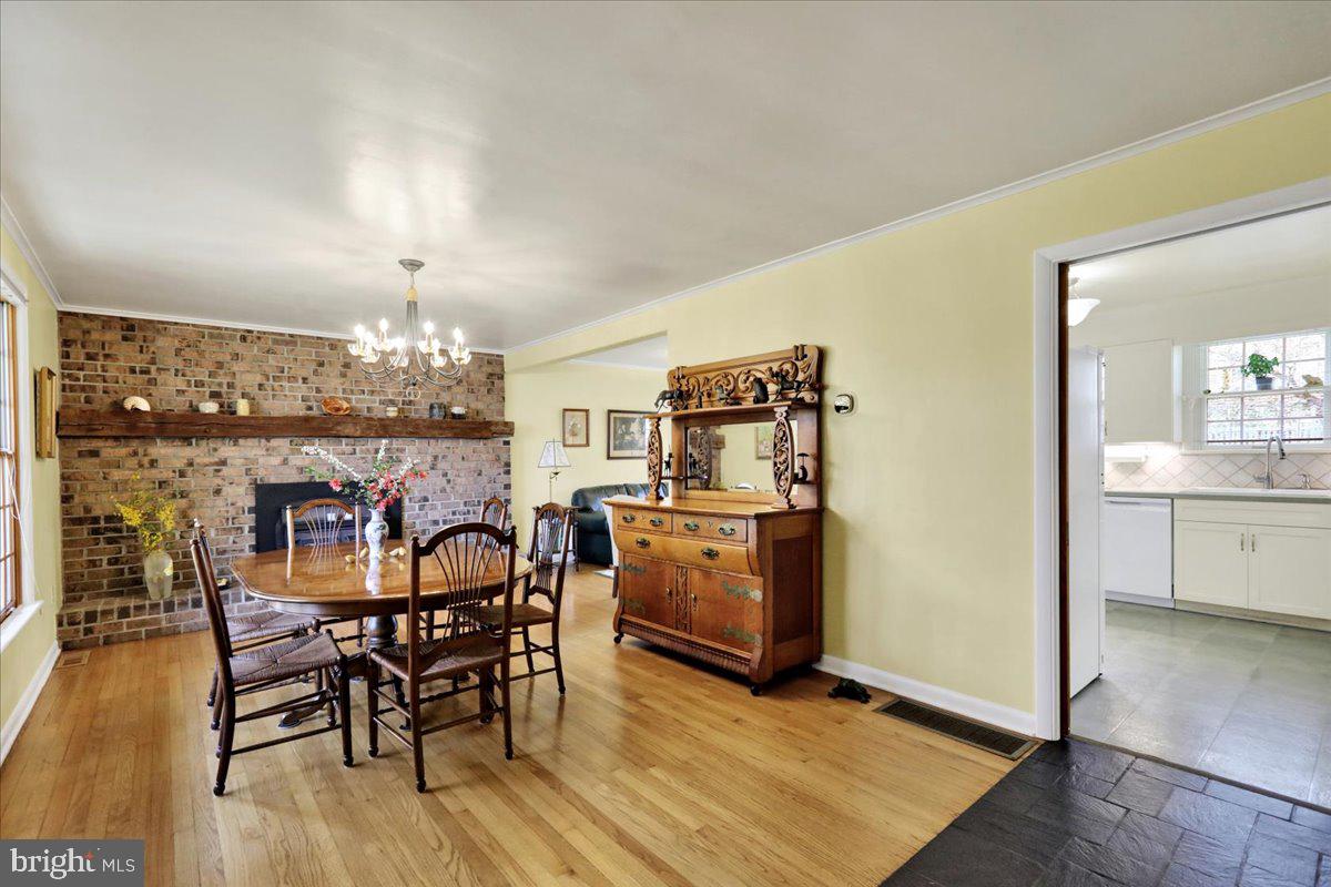 250 Clearfield Road New Providence, PA 17560 - Photo 9 of 35 a view of a dining room with furniture and chandelier