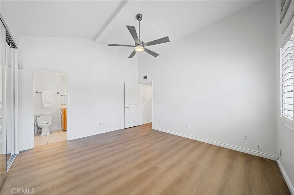 4277 Las Virgenes Road Calabasas, CA 91302 - Photo 14 of 28 Large main suite has an upgraded bathroom and views of the main pool. New floors and new paint. Plantation shutters throughout. Move-in ready.