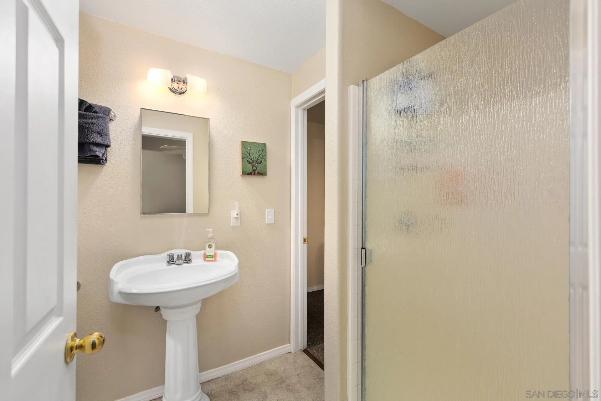 24655 Upper Rim Rock Road Idyllwild, CA 92549 - Photo 31 of 48 a bathroom with a sink and a mirror