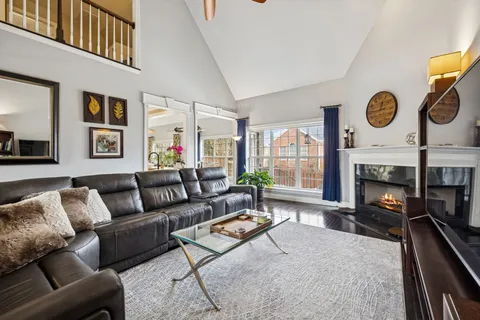 a kitchen with stainless steel appliances granite countertop a sink and cabinets