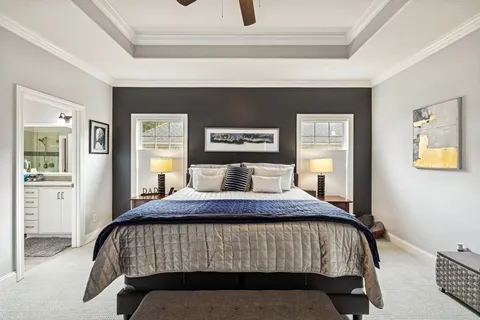 a kitchen with stainless steel appliances granite countertop a sink refrigerator and microwave