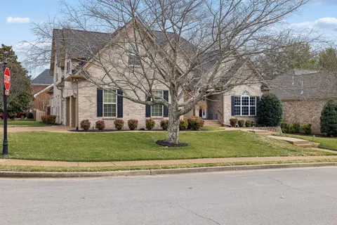 a front view of a house with glass door