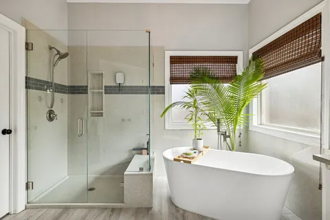 a view of a dining room with furniture a chandelier and wooden floor