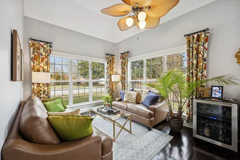 a view of a house with backyard and porch