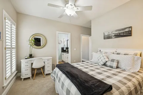 a view of a house with backyard porch and furniture