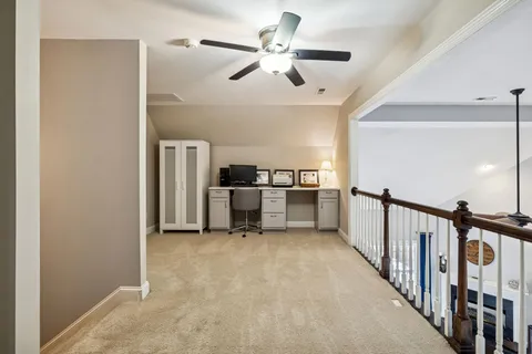 an aerial view of houses with outdoor space