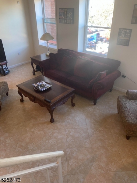 14 Jaques Street, Unit 24 Elizabeth, NJ 07201 - Photo 13 of 17 a living room with furniture