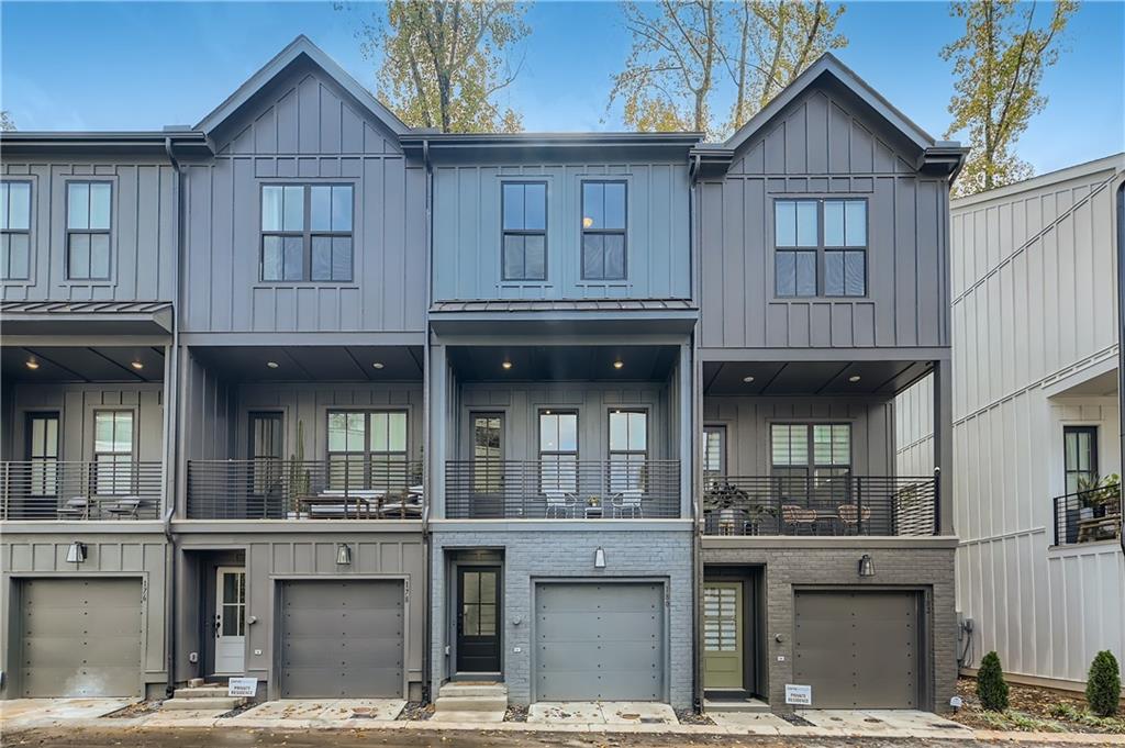 180 Chestnut Circle Atlanta, GA 30342 - Photo 1 of 1 a front view of multiple houses