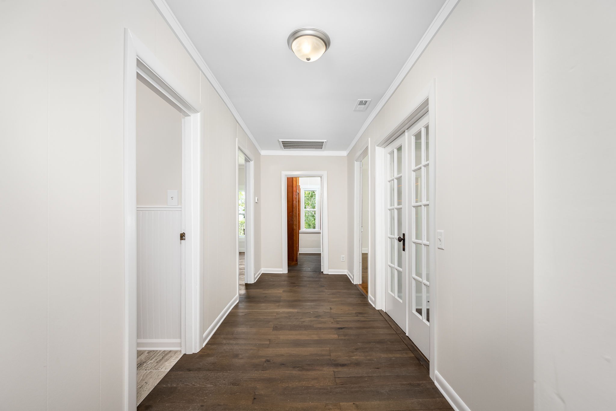 112 R E Davenport Avenue Auburntown, TN 37016 - Photo 20 of 43 a view of a hallway with wooden floor and staircase