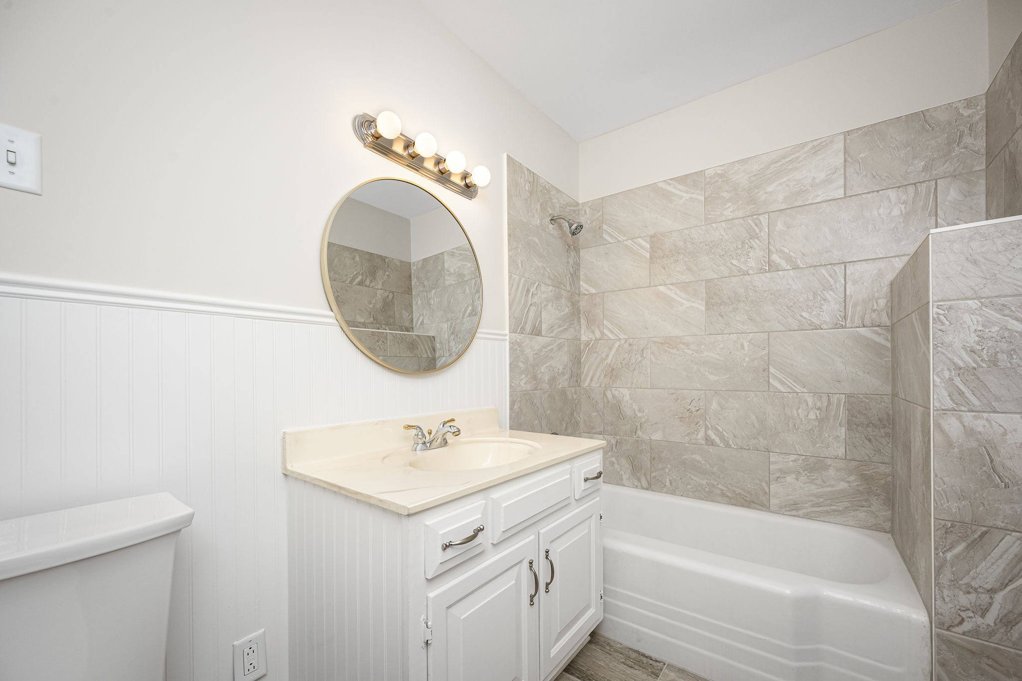112 R E Davenport Avenue Auburntown, TN 37016 - Photo 21 of 43 a bathroom with a sink and a mirror