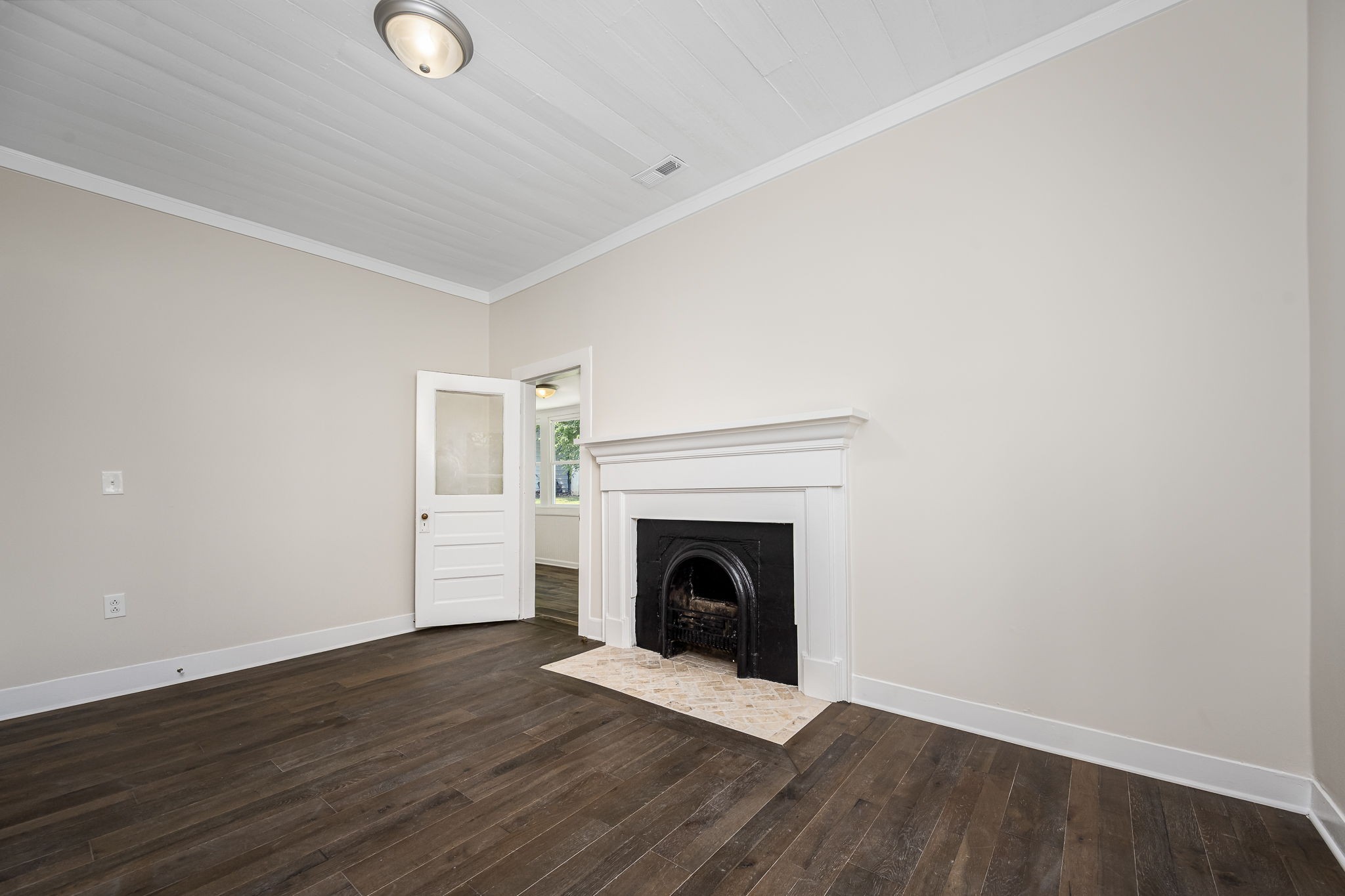 112 R E Davenport Avenue Auburntown, TN 37016 - Photo 27 of 43 a view of a livingroom with wooden floor and a fireplace