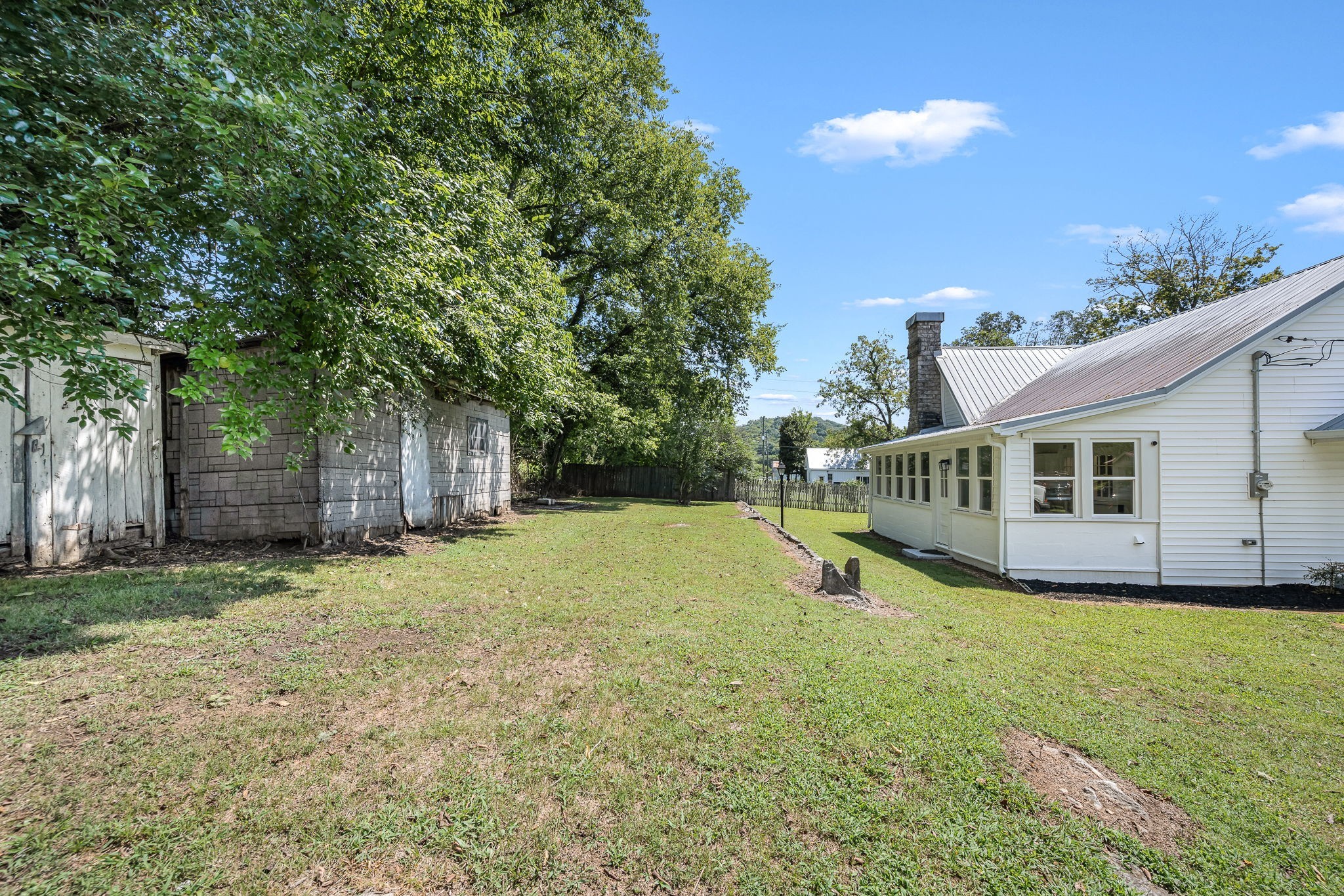 112 R E Davenport Avenue Auburntown, TN 37016 - Photo 40 of 43 a view of a house with backyard and tree