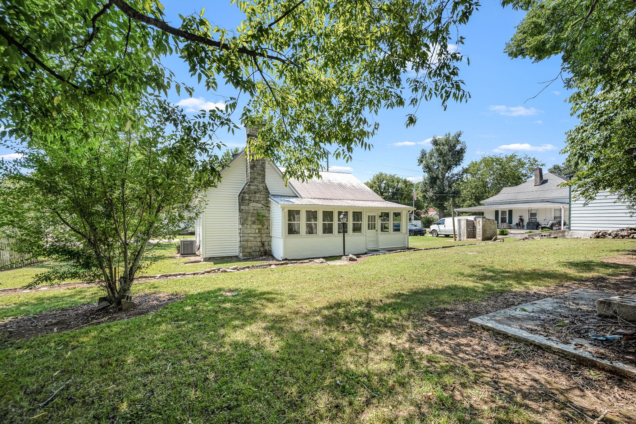 112 R E Davenport Avenue Auburntown, TN 37016 - Photo 41 of 43 a view of a house with a yard